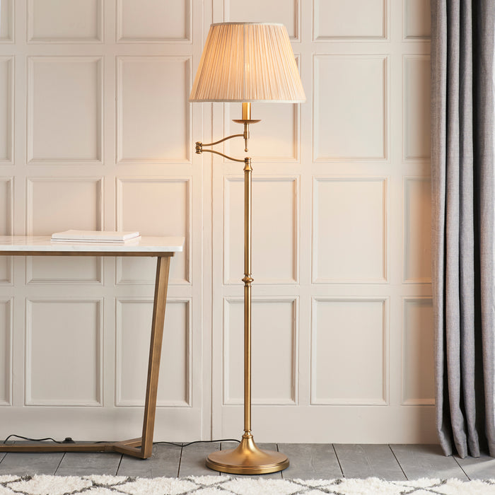 Interiors 1900 Stanford antique brass Swing arm floor lamp with beige shade
